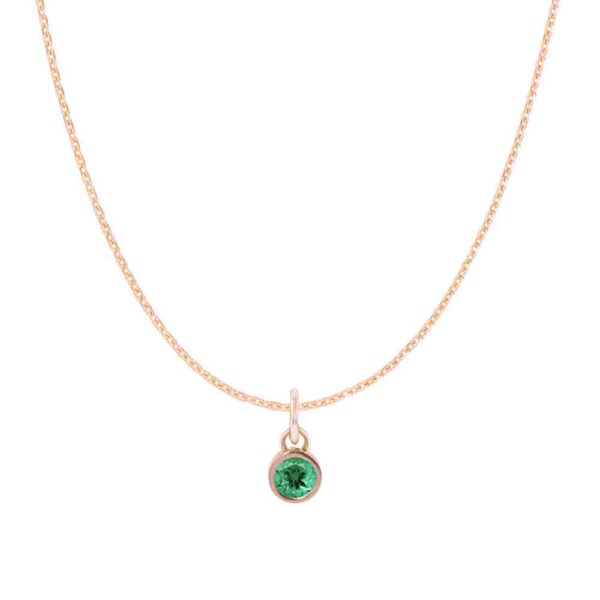 emerald-charm-necklace-closeup.jpg emerald-charm-necklace-closeup.jpg