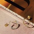 spiral-sideways-diamond-hoop-earringsearrings-996101.jpg
