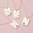 zodiac-charm-necklaces-styled.jpg